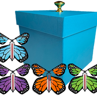 Blue Exploding Butterfly Gift Box With 4 Multi Color Monarch Wind Up Flying Butterflies from butterflyers.com