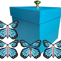 Blue Exploding Butterfly Gift Box With 4 Blue Monarch Wind Up Flying Butterflies from butterflyers.com