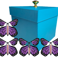 Blue Exploding Butterfly Gift Box With 4 Purple Monarch Wind Up Flying Butterflies from butterflyers.com