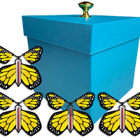 Blue Exploding Butterfly Gift Box With 4 Yellow Monarch Wind Up Flying Butterflies from butterflyers.com