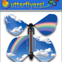 Blue Sky Rainbow Wind Up Flying Butterfly For Greeting Cards by Butterflyers.com