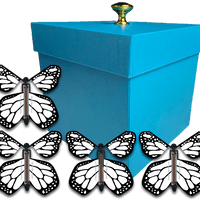 Blue Exploding Butterfly Gift Box With 4 White Monarch Wind Up Flying Butterflies from butterflyers.com