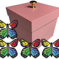 Pink Exploding Butterfly Gift Box With 4 Rainbow Monarch Wind Up Flying Butterflies from butterflyers.com
