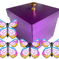 Purple Exploding Butterfly Gift Box With 4 Bismuth Color Wind Up Flying Butterflies from butterflyers.com