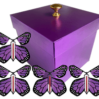 Purple Exploding Butterfly Gift Box With 4 Purple Monarch Wind Up Flying Butterflies from butterflyers.com