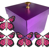 Purple Exploding Butterfly Gift Box With 4 Pink Monarch Wind Up Flying Butterflies from butterflyers.com