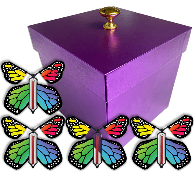 Purple Exploding Butterfly Gift Box With 4 Rainbow Monarch Wind Up Flying Butterflies from butterflyers.com