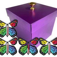 Purple Exploding Butterfly Gift Box With 4 Rainbow Monarch Wind Up Flying Butterflies from butterflyers.com