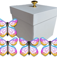 White Easter Exploding Butterfly Gift Box With 4 Bismuth Color Monarch Wind Up Flying Butterflies from butterflyers.com