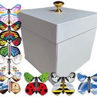 White Easter Exploding Butterfly Box With 4 Wind Up Flying Easter Butterflies from butterflyers.com