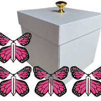 White Exploding Butterfly Gift Box With 4 Pink Monarch Wind Up Flying Butterflies from butterflyers.com