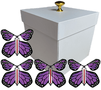 
              White Exploding Butterfly Gift Box With 4 Purple Monarch Wind Up Flying Butterflies from butterflyers.com
            