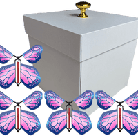 White Exploding Butterfly Gift Box With 4 Cobalt Pink Wind Up Flying Butterflies from butterflyers.com
