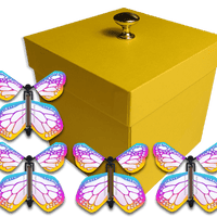 Yellow Exploding Butterfly Gift Box With 4 Bismuth Monarch Wind Up Flying Butterflies from butterflyers.com
