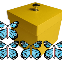 Yellow Exploding Butterfly Gift Box With 4 Blue Monarch Wind Up Flying Butterflies from butterflyers.com