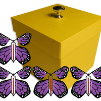 Yellow Exploding Butterfly Gift Box With 4 Purple Monarch Wind Up Flying Butterflies from butterflyers.com