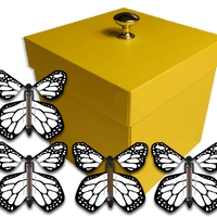 Yellow Exploding Butterfly Gift Box With 4 White Monarch Wind Up Flying Butterflies from butterflyers.com